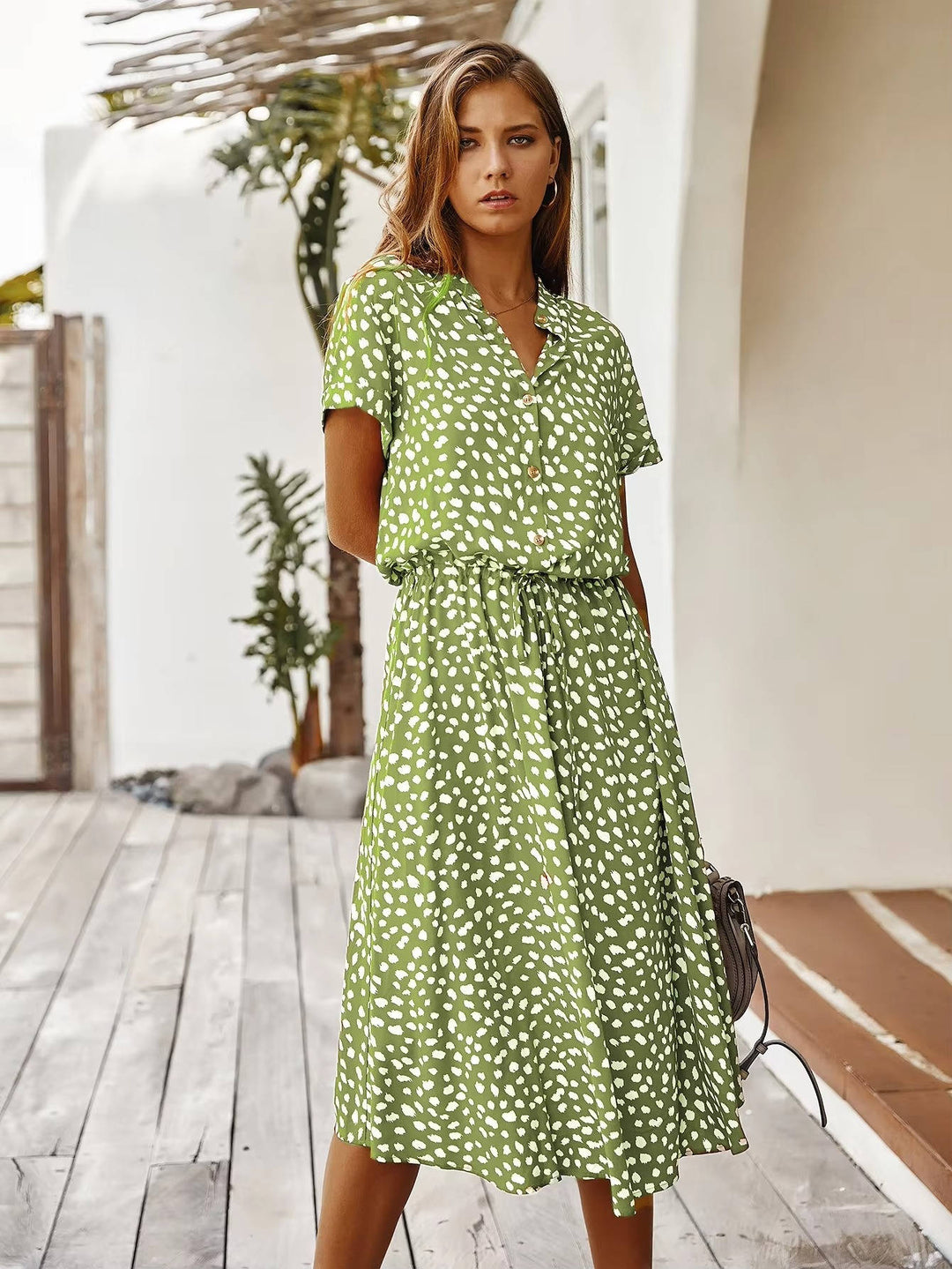 Linnet - Robe midi imprimée ceinturée
