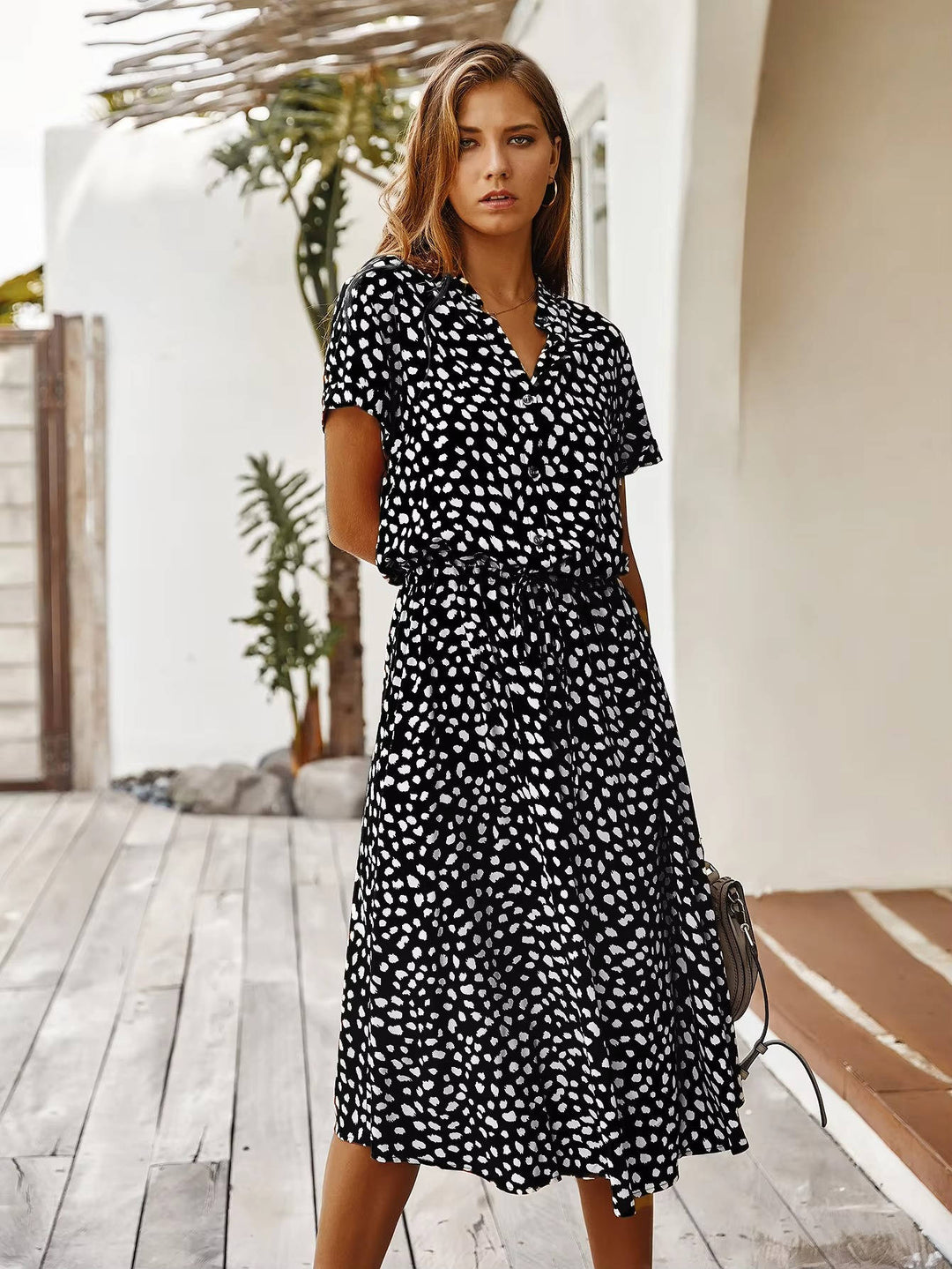 Linnet - Robe midi imprimée ceinturée